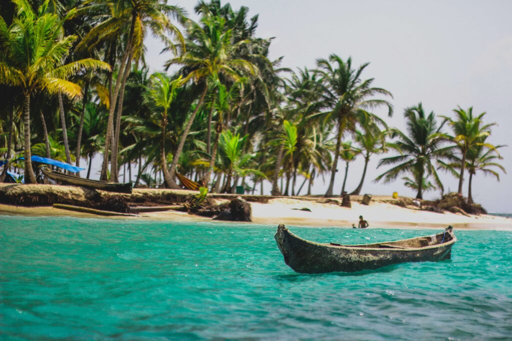 Pristine beach on the San Blas Islands, Panama – Crystal clear waters, white sandy shores, and palm trees create a tropical paradise in the San Blas Archipelago